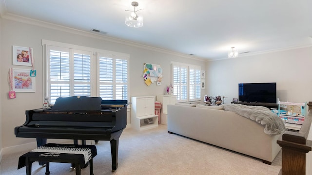 living area with visible vents, crown molding, and light carpet