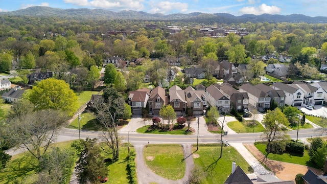 birds eye view of property featuring a residential view and a mountain view