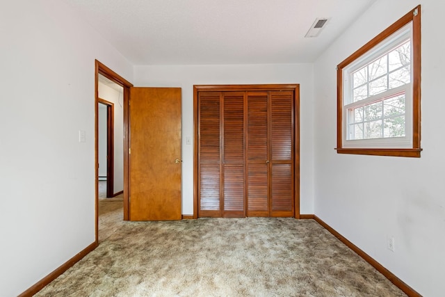 4103 Arno Rd, Franklin, TN 37064 - unfurnished bedroom with baseboards, carpet floors, visible vents, and a closet