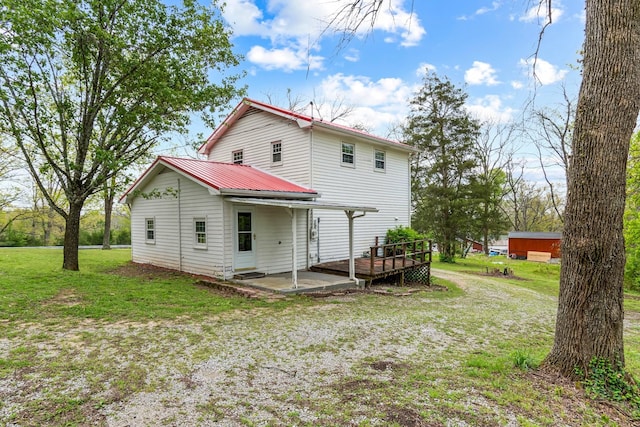 4103 Arno Rd, Franklin, TN 37064 - back of house featuring a wooden deck, a yard, a patio area, and metal roof