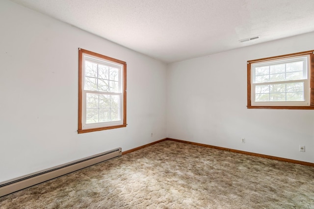 4103 Arno Rd, Franklin, TN 37064 - carpeted spare room with baseboards, plenty of natural light, visible vents, and baseboard heating