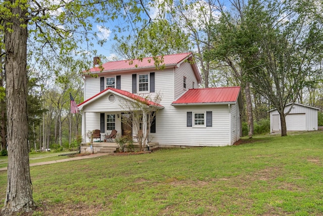 4103 Arno Rd, Franklin, TN 37064 - view of front of home with a chimney, a detached garage, a porch, a front yard, and metal roof