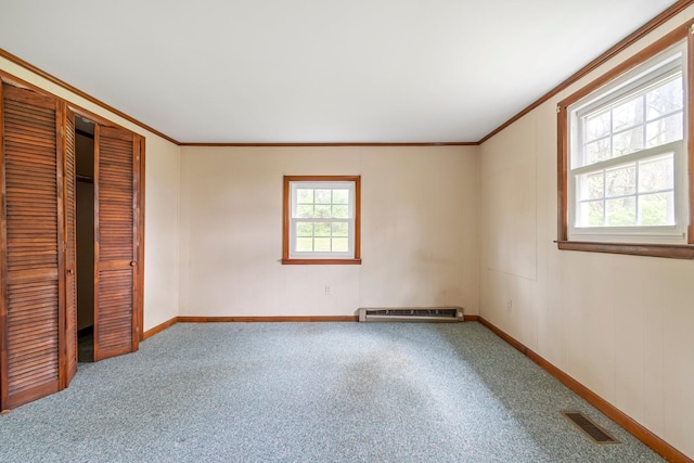 4103 Arno Rd, Franklin, TN 37064 - unfurnished bedroom featuring carpet flooring, visible vents, a baseboard radiator, and crown molding