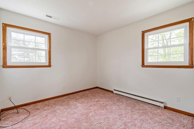 4103 Arno Rd, Franklin, TN 37064 - carpeted empty room featuring baseboards, a healthy amount of sunlight, baseboard heating, and visible vents