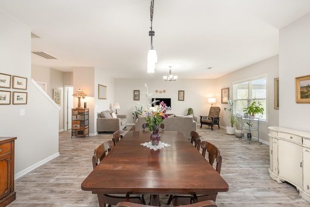 1517 Rockwood Ln, Lebanon, TN 37087 - dining space featuring baseboards, light wood-style floors, and visible vents