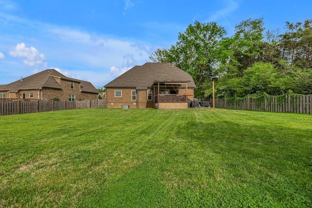 1026 Claymill Dr, Spring Hill, TN 37174 - rear view of house featuring brick siding, a yard, and a fenced backyard