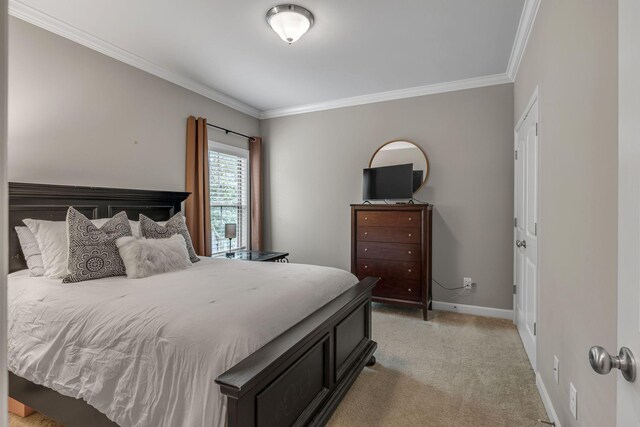 1026 Claymill Dr, Spring Hill, TN 37174 - bedroom featuring light colored carpet, baseboards, and crown molding