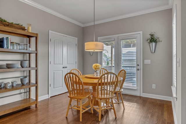 1026 Claymill Dr, Spring Hill, TN 37174 - dining space featuring baseboards, wood finished floors, and crown molding