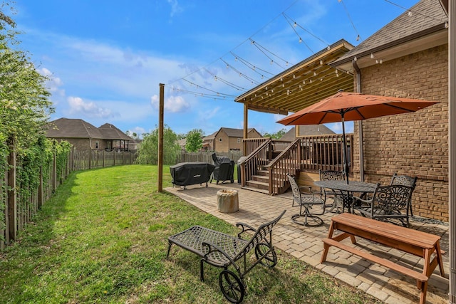1026 Claymill Dr, Spring Hill, TN 37174 - view of yard featuring a wooden deck, a patio, and a fenced backyard