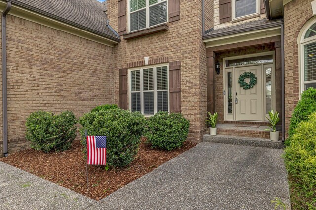 1026 Claymill Dr, Spring Hill, TN 37174 - doorway to property with a shingled roof and brick siding