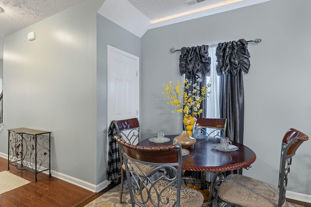 3367 William Bailey Dr, Nashville, TN 37207 - dining room with visible vents, baseboards, wood finished floors, and a textured ceiling