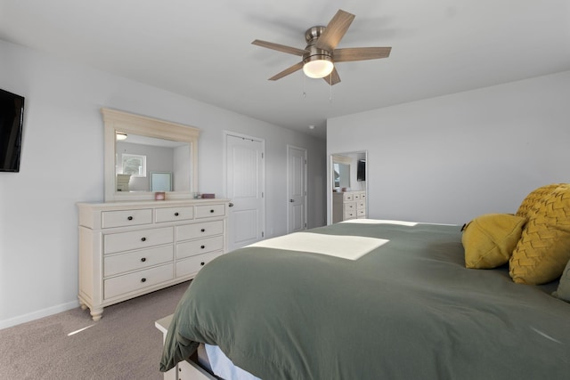 bedroom featuring baseboards, carpet, and ceiling fan