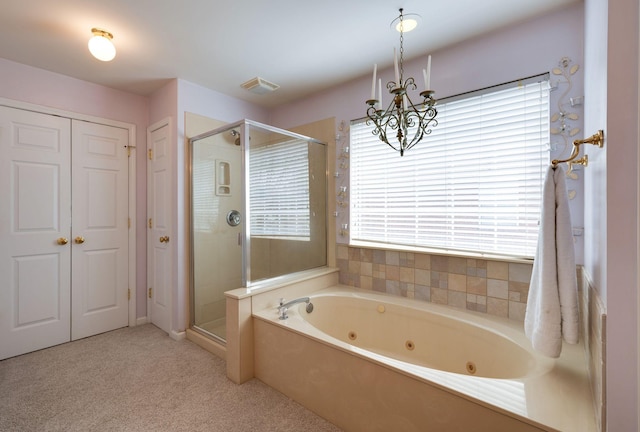 304 Hay Market Ct, Franklin, TN 37067 - full bath with a jetted tub, visible vents, an inviting chandelier, and a stall shower