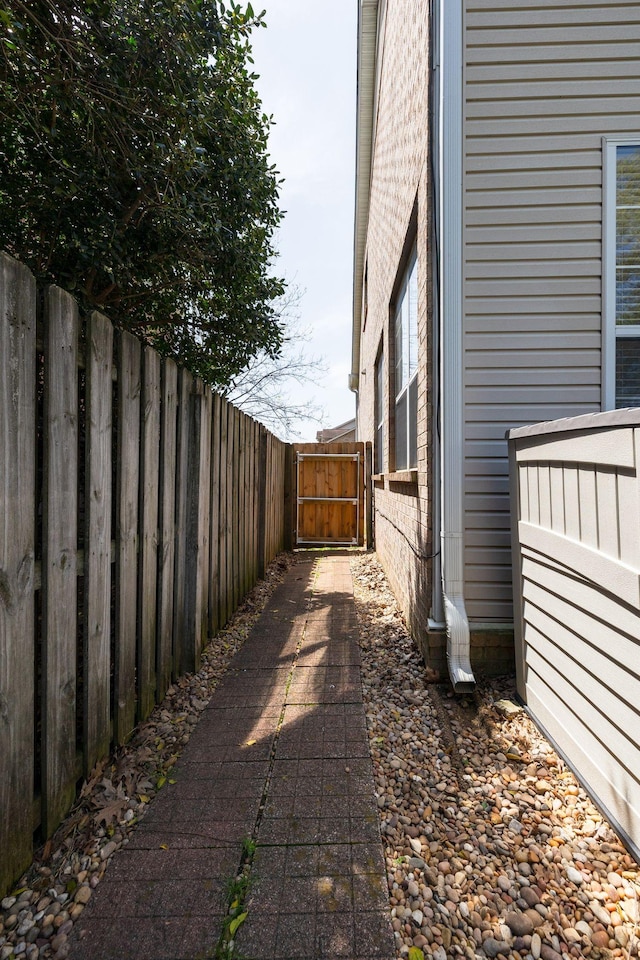 304 Hay Market Ct, Franklin, TN 37067 - view of side of home featuring fence and a gate