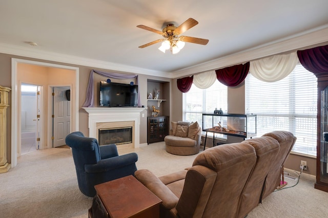 304 Hay Market Ct, Franklin, TN 37067 - living area with a ceiling fan, a glass covered fireplace, light carpet, baseboards, and ornamental molding
