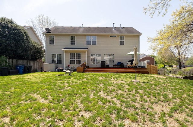 304 Hay Market Ct, Franklin, TN 37067 - rear view of house with a wooden deck, a yard, and fence