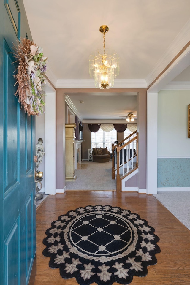 304 Hay Market Ct, Franklin, TN 37067 - foyer entrance featuring stairway, crown molding, wood finished floors, a chandelier, and baseboards