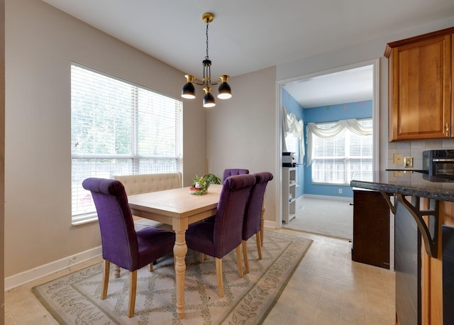 304 Hay Market Ct, Franklin, TN 37067 - dining room featuring baseboards and a notable chandelier