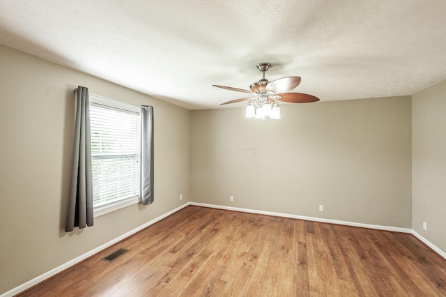 327 Arabian Ln, Springfield, TN 37172 - spare room featuring light wood finished floors, visible vents, baseboards, a textured ceiling, and ceiling fan