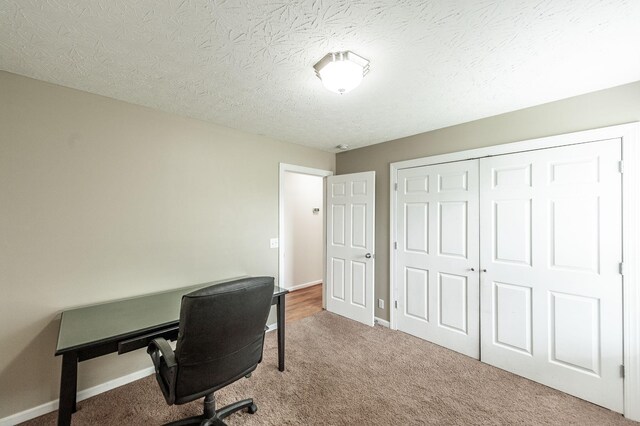 327 Arabian Ln, Springfield, TN 37172 - home office with baseboards, carpet flooring, and a textured ceiling