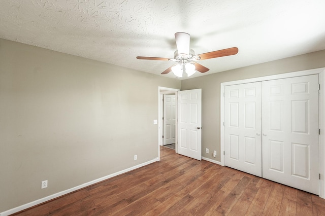 327 Arabian Ln, Springfield, TN 37172 - unfurnished bedroom with hardwood / wood-style flooring, ceiling fan, baseboards, and a closet