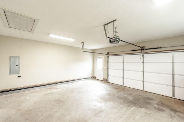 327 Arabian Ln, Springfield, TN 37172 - garage featuring a garage door opener and electric panel