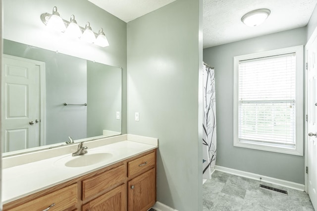 327 Arabian Ln, Springfield, TN 37172 - full bath with visible vents, baseboards, vanity, and a shower with shower curtain