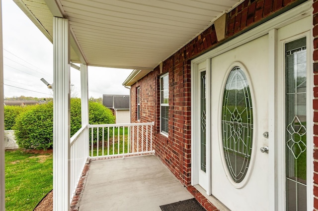 327 Arabian Ln, Springfield, TN 37172 - property entrance with a porch and brick siding