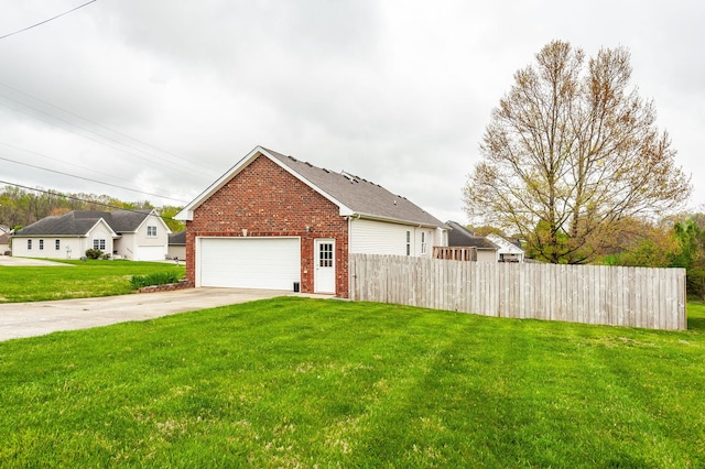 327 Arabian Ln, Springfield, TN 37172 - view of home's exterior featuring a lawn, brick siding, fence, and driveway