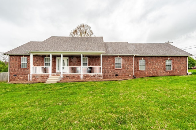 327 Arabian Ln, Springfield, TN 37172 - view of front of home with crawl space, covered porch, brick siding, roof with shingles, and a front yard