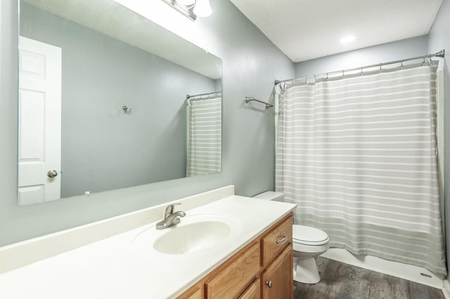 327 Arabian Ln, Springfield, TN 37172 - bathroom featuring a shower with shower curtain, wood finished floors, toilet, and vanity