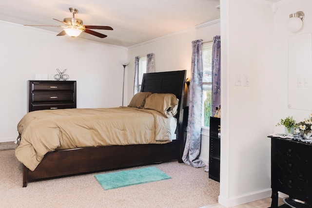 1005 Chris Dr, Portland, TN 37148 - bedroom featuring a ceiling fan, carpet floors, ornamental molding, and baseboards