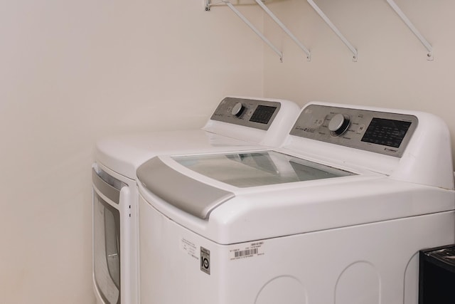 1005 Chris Dr, Portland, TN 37148 - laundry area featuring separate washer and dryer and laundry area