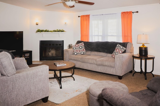 1005 Chris Dr, Portland, TN 37148 - living area featuring a ceiling fan, a glass covered fireplace, and carpet floors