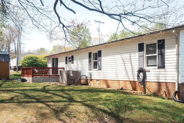 1005 Chris Dr, Portland, TN 37148 - rear view of property featuring a wooden deck, crawl space, and a yard