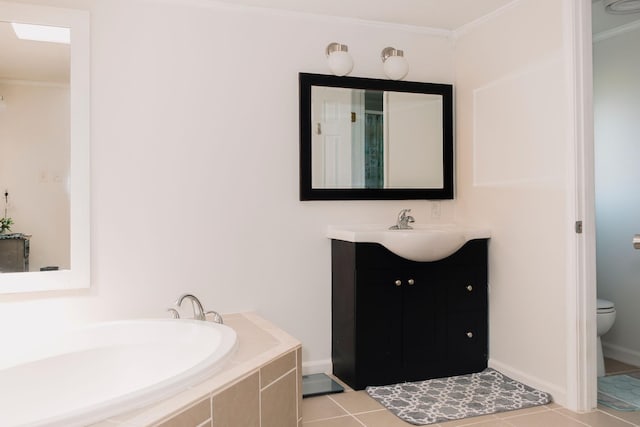 1005 Chris Dr, Portland, TN 37148 - bathroom with a garden tub, crown molding, tile patterned floors, vanity, and toilet