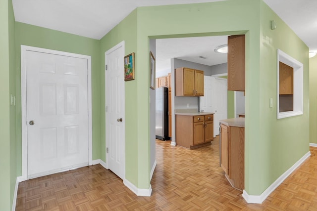 corridor with baseboards