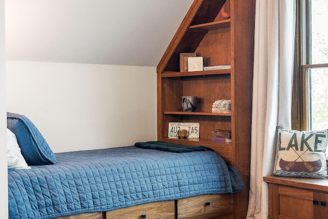 bedroom with multiple windows