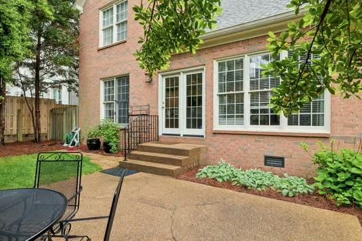 property entrance featuring fence, a patio, and crawl space
