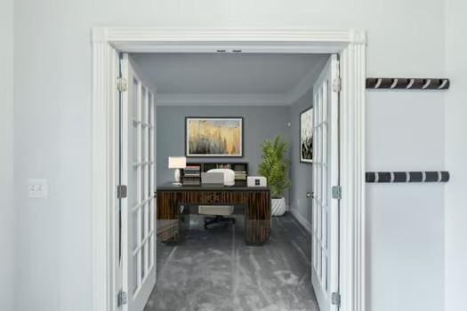 carpeted office space with crown molding