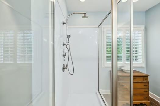 full bathroom with a stall shower