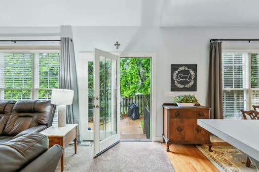 doorway to outside featuring healthy amount of natural light, french doors, and wood finished floors
