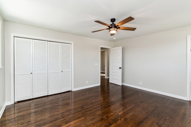 4052 Kings Ln, Nashville, TN 37218 - unfurnished bedroom with baseboards, dark wood-type flooring, and a closet