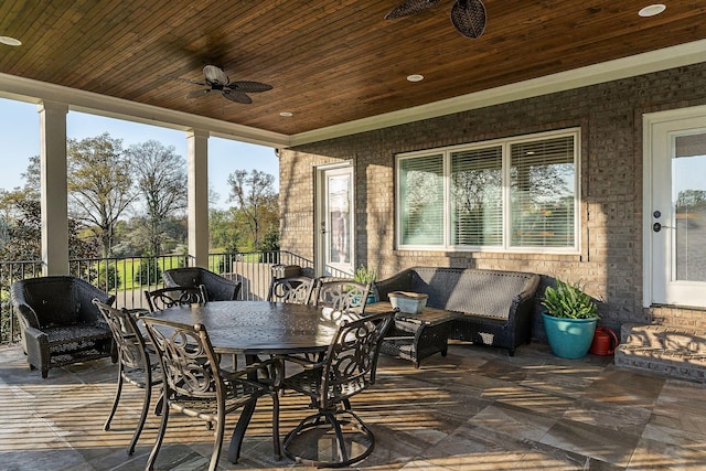 view of patio with outdoor lounge area and ceiling fan