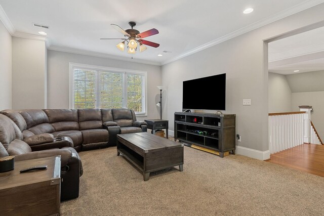 living room with recessed lighting, visible vents, ornamental molding, and ceiling fan