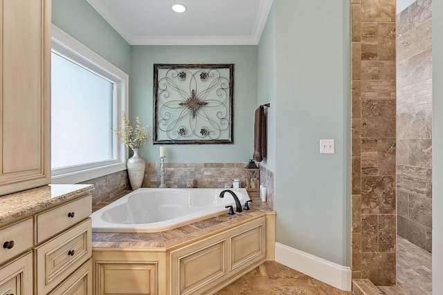 full bath featuring a tile shower, a garden tub, crown molding, and baseboards