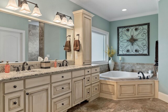 bathroom featuring a garden tub, ornamental molding, a sink, and double vanity