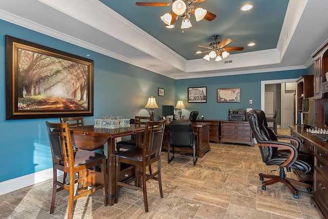 office space featuring a ceiling fan, stone tile flooring, a raised ceiling, ornamental molding, and recessed lighting