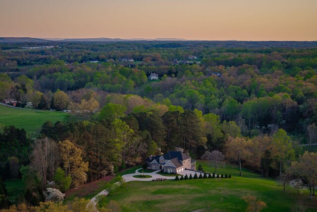 aerial view featuring a view of trees
