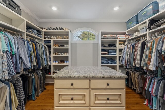 spacious closet with wood finished floors
